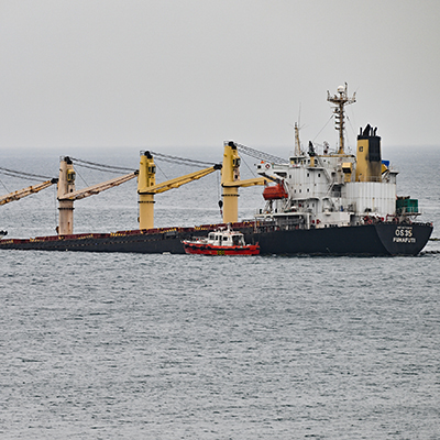 Resolve Marine alongside partially sunken bulk carrier OS-35.